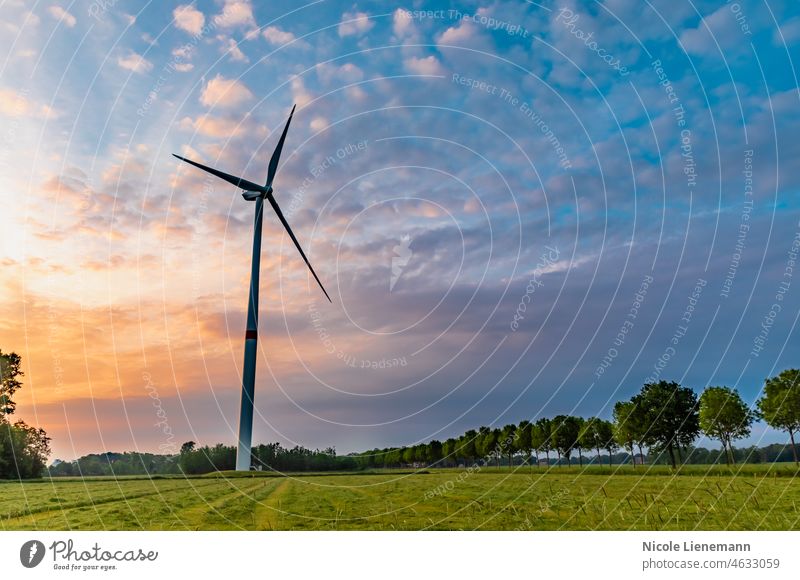 pinwheel in sunset windmill in sun energy farm landscape hdr sky renewable generator nature green generators field technology environment mountain electricity