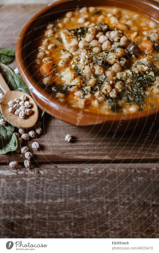 Potaje is a typical Spanish food. Vegan food. Chickpeas with chard. vegan stew chickpea cooked traditional homemade spanish spinach plate dish vegetable rustic