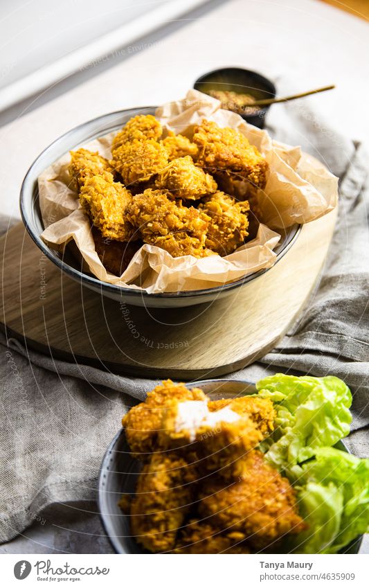 vegan fried nuggets in a bowl with sides Dinner lime Studio shot Organic produce Frying tofu Gourmet Cooking Lunch vegan protein Fresh Fried chicken Nutrition