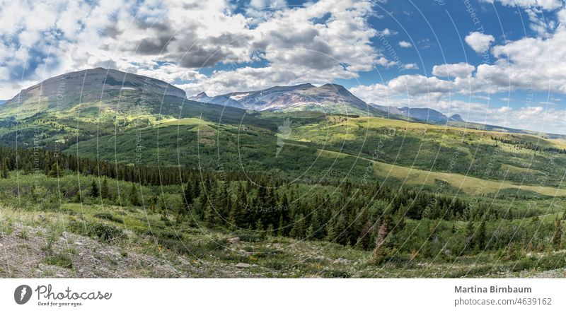 Panoramic view over mountain ranges of the Rockies in the Glacier National Park, Montana glacier national park montana panoramic landscape travel outdoor nature