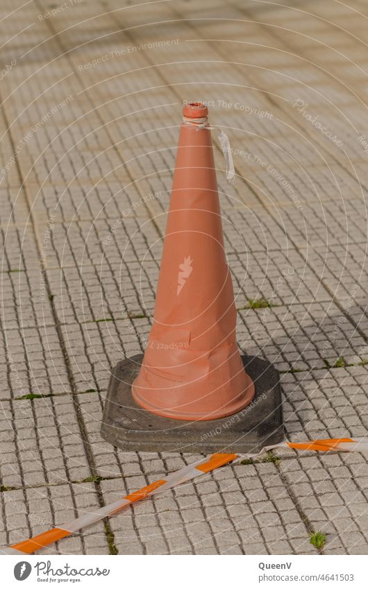Old barrier cone in orange Shut-off cone guiding cone Asphalt Safety Signs and labeling Road sign Street Road traffic Lanes & trails Signage Construction site