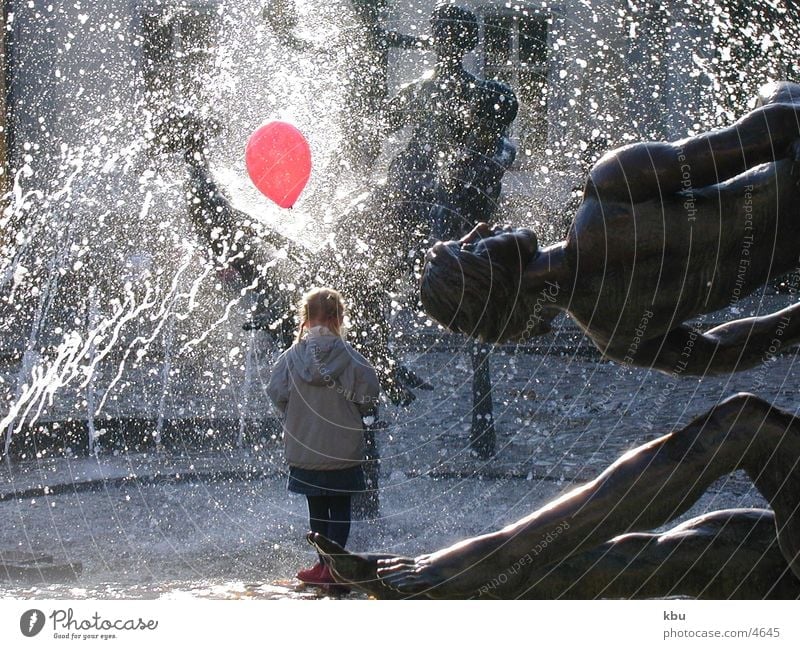 redBalloon Snapshot Human being Fountain of Friendship in Rostock