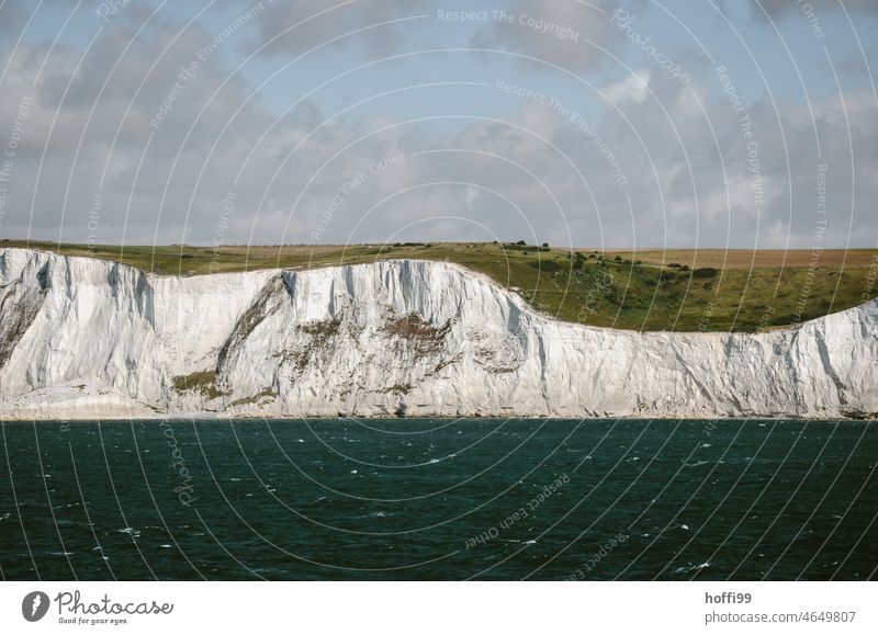 cliff in the south of England Rock Limestone rock Cliff steep coast Kent Dover chalk cliffs white cliffs Island chalk coast Channel English Channel Summer Stone