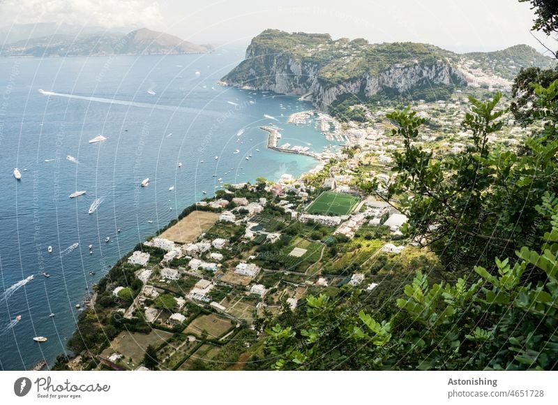 View of the sea and the harbor, Capri, Italy Ocean Vantage point Water Harbour coast bank Island Beach Summer Sky Horizon Green Blue variegated foliage leaves