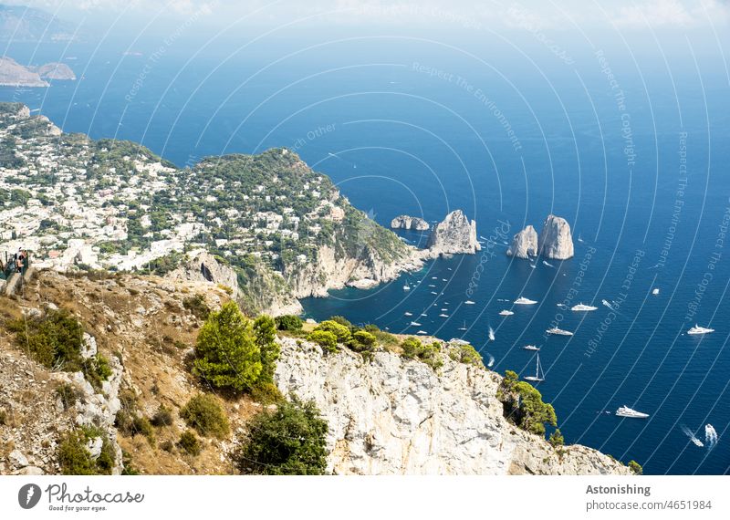 https://www.photocase.com/photos/4651984-view-of-the-faraglioni-rocks-capri-italy-ocean-photocase-stock-photo-large.jpeg