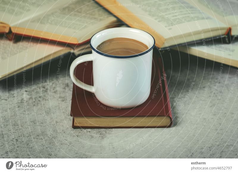 Books and cup of coffee. Selective focus books read textbook know learn study relax bookstore reading relaxing library hobby leisure comfort winter blanket