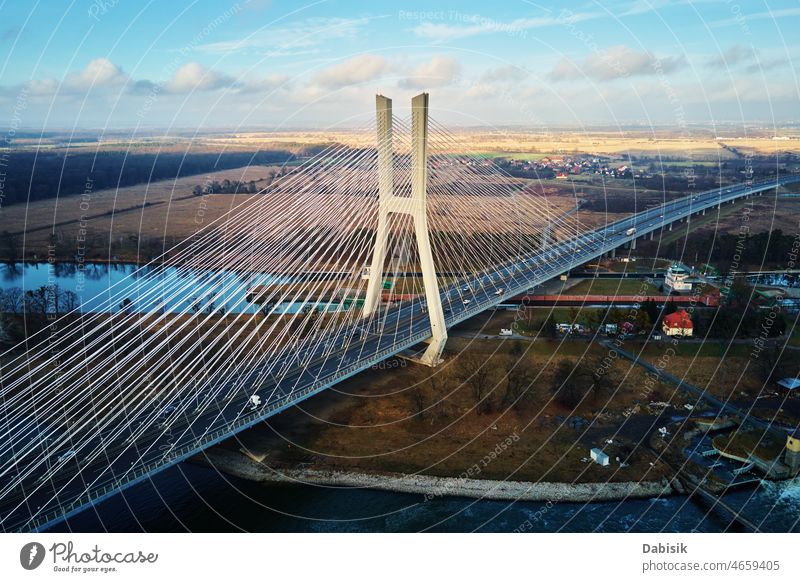 Large bridge over river with cars traffic aerial transport road highway landscape wroclaw redzinski nature bird eye view sky moving driving top city overhead