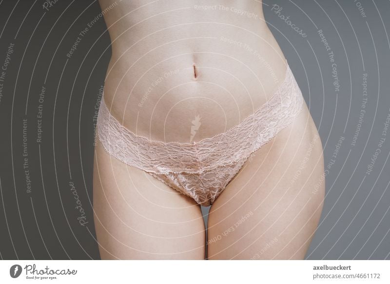 female hips with pink lace panties - a Royalty Free Stock Photo from  Photocase