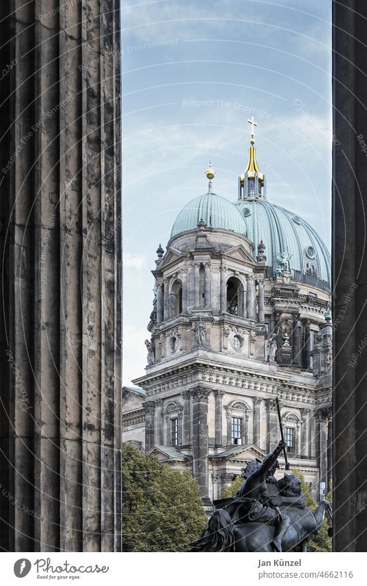 Berlin Cathedral between columns Museum island Church Domed roof dome Crucifix Christianity Tourist Attraction Germany Pleasure garden Downtown Berlin