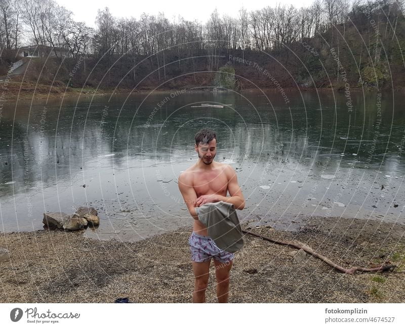 young man with naked torso at icy swimming lake Ice bathing Upper body Naked Winter Ice Swimming immune system Freeze Cold be afloat bathe move out Attract