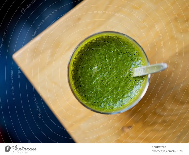 A cup of matcha tee on the table from above matcha tea matcha tea powder Café Table flat lay above view drink