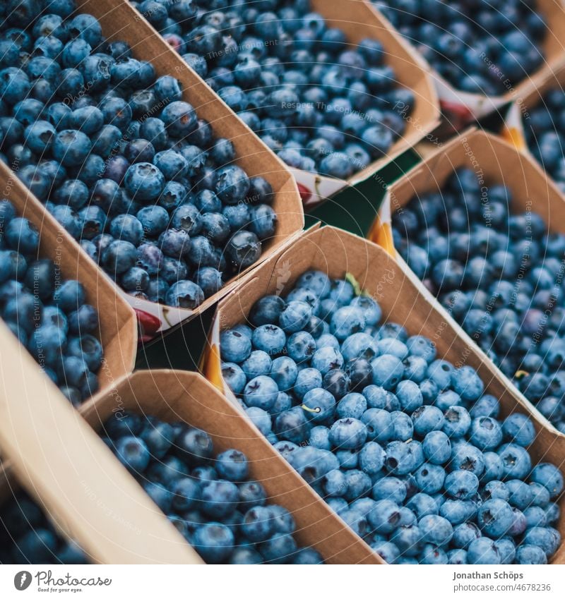 Buy blueberries at the market Blueberry Markets Supermarket Marketplace fruit Berries salubriously antioxidants vitamins Shopping Food Delicious seasonal Fresh