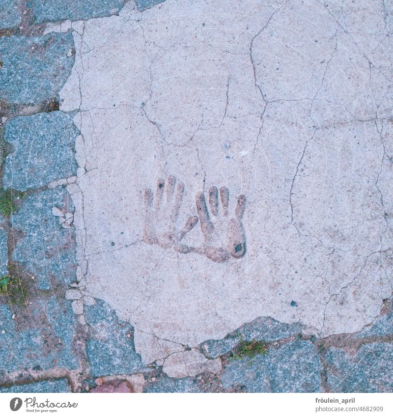 Impression with emphasis Hand hands handprint Imprint Tracks Detail Fingers Creativity Cement Cemented pavement Structures and shapes Memory Touch