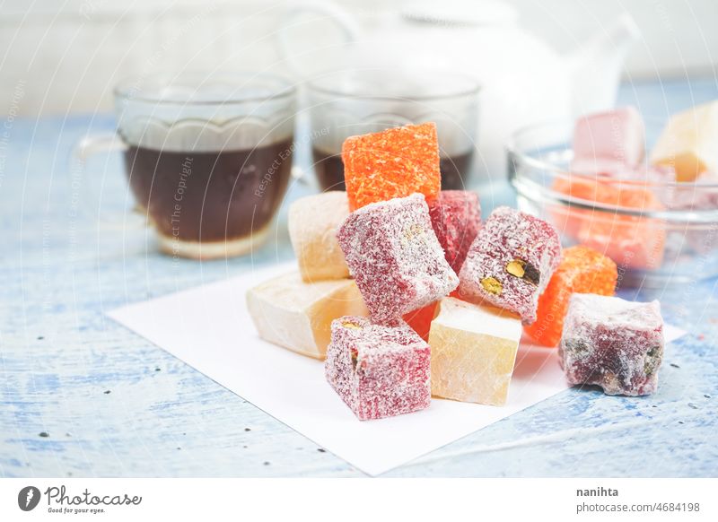 Delicious turkish delights with black tea food delicious temptation gourmet fruit sweet dessert traditional turkish food asian arabian arabic delicatessen drink