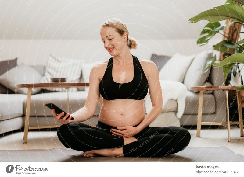 Pregnancy Yoga and Fitness concept. Healthy maternity lifestyle