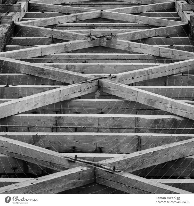 Joist Wood wooden beams construction Build carpenter Carpentry Crucifix Across Diagonal criss-cross Parallel Iron Screw Pattern background texture B/W