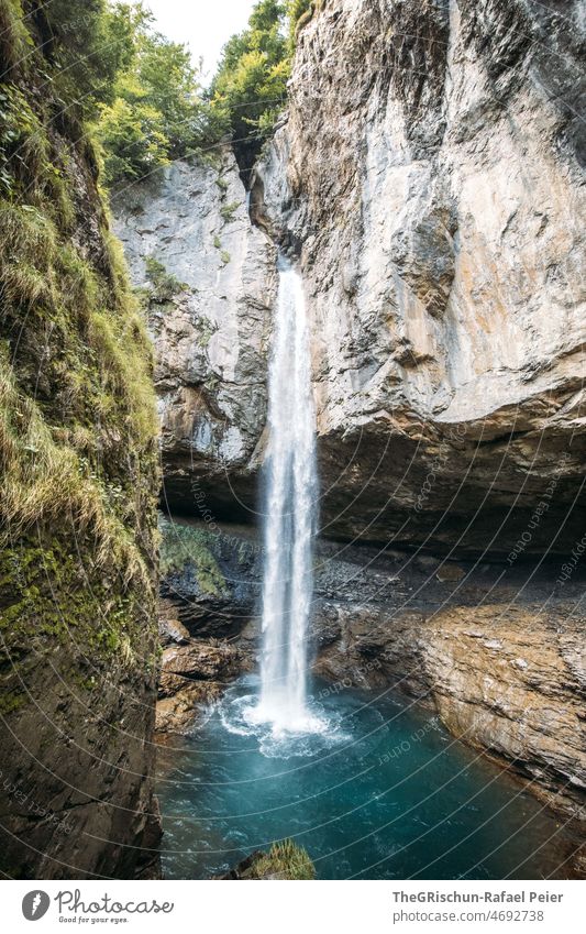 Waterfall in rock Glarus Rock Blue clear rocky Wall of rock Mountain Landscape Exterior shot Deserted Colour photo