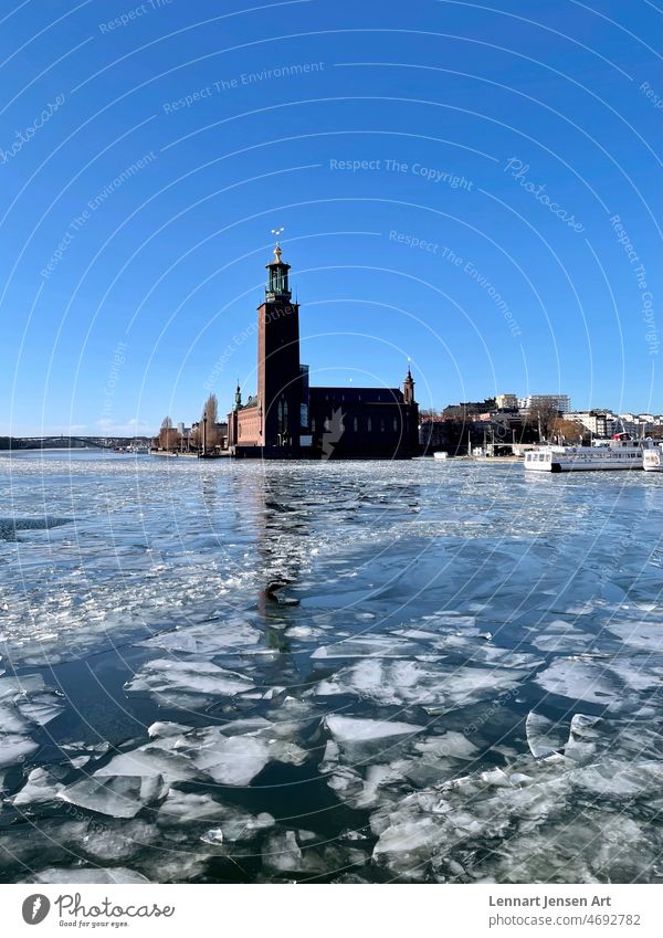City Hall Stockholm city hall stockholm sweden sight town water ice winter blue sky capital tower tourism exterior outdoor colour boats ice floes cloud-free