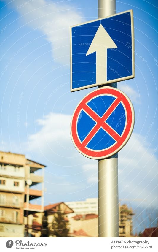 Road sign view against the blue sky. auto automobile background business car caution city direction forbidden german highway icon information law logo