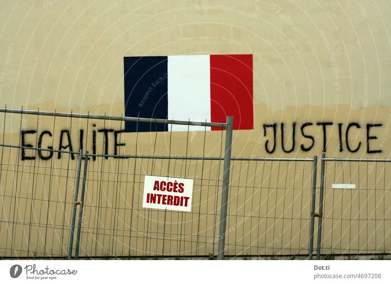 Egalité Justice justice France flag embassy Facade Fence Hoarding Painted Signs and labeling Prohibition sign cordon Grating Graffiti equality Fairness