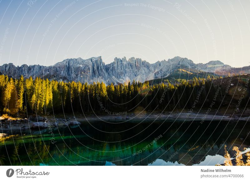 View of the Karersee Lake Lakeside lake view latemar Rose garden Dolomites Exterior shot Landscape Nature Mountain Deserted Colour photo Day Water Alps