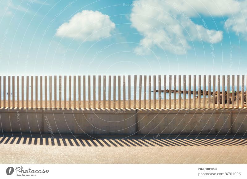 Separation fence on the beach over blue sky Clouds Beach Blue Sky Blue sky Summer Sun bright day Nature Beautiful weather Bright Exterior shot Landscape