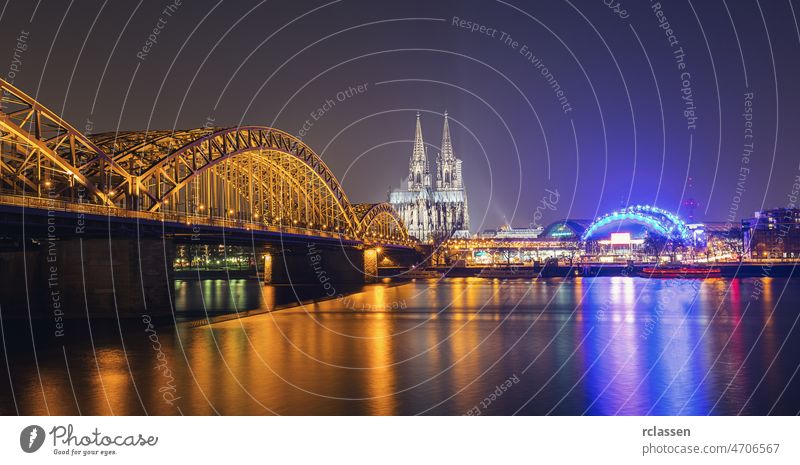 cologne cathedral with Hohenzollern bridge city old town Rhine Germany Cathedral dom Cityscape river carnival kölsch church europe twilight gothic tourism night