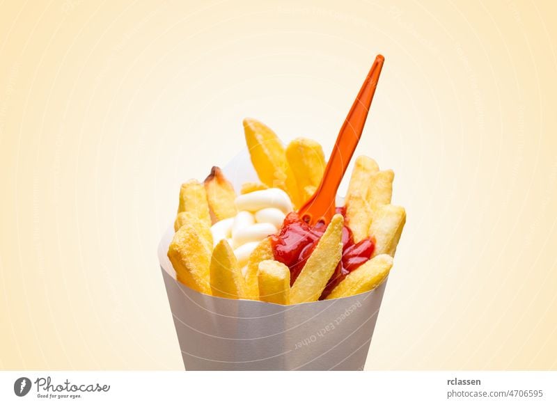 french fries red - white with fork French bag frit portion potato Pommes Cornet Dutch snack German potato rod fries stand fritüre thick eat paper bag chips