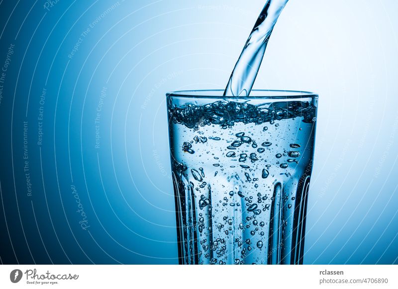 Glass of water and straw reflection hi-res stock photography and