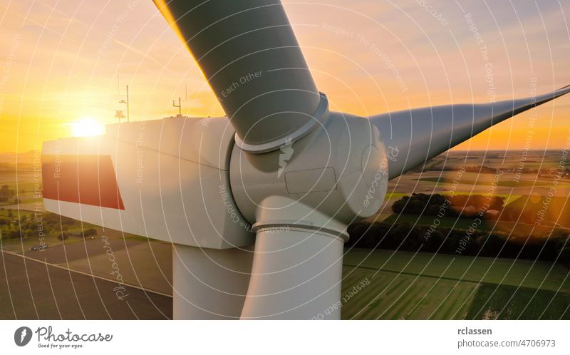Detail of wind turbine, at sunset, copyspace for your individual text. power windmill aerial grid sustainable weather clean eco lines pollution renewable