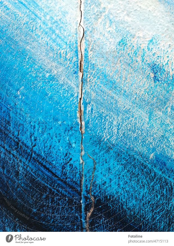 A long crack runs through the wall painted in different shades of blue Wall (building) Plastered Crack & Rip & Tear Blue dark blue light blue White