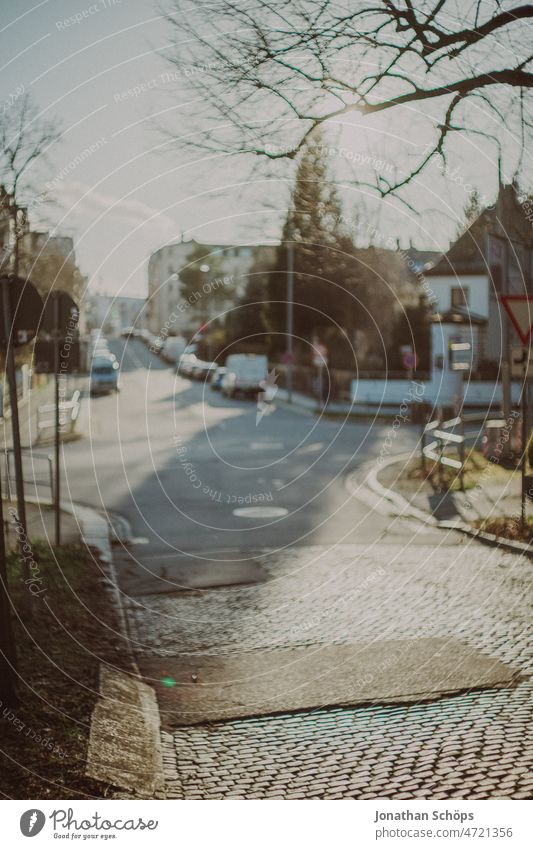 car free street crossing in the winter sun Car-free Sunday Crossroads Footpath Winter Autumn vintage movie Retro Analog Roadside Asphalt Gray Empty urban