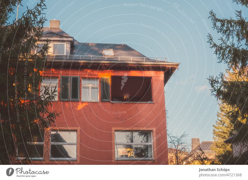 red facade old building house in evening light Facade Old building House (Residential Structure) Shutter shutters Shadow Apartment house Home Outskirts Town