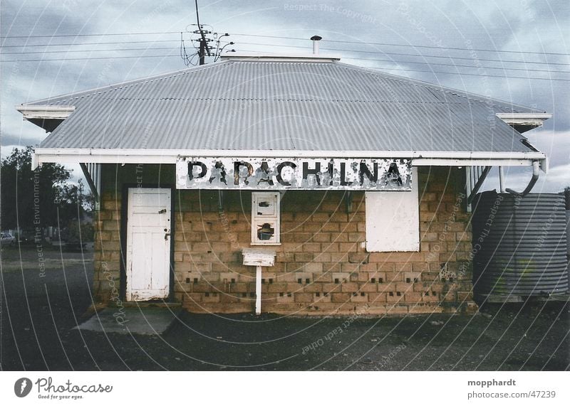 Parachilna railway station Railroad Railroad tracks Outback Australia Derelict Clouds Brick Electricity pylon Letters (alphabet) Train station Hut Old