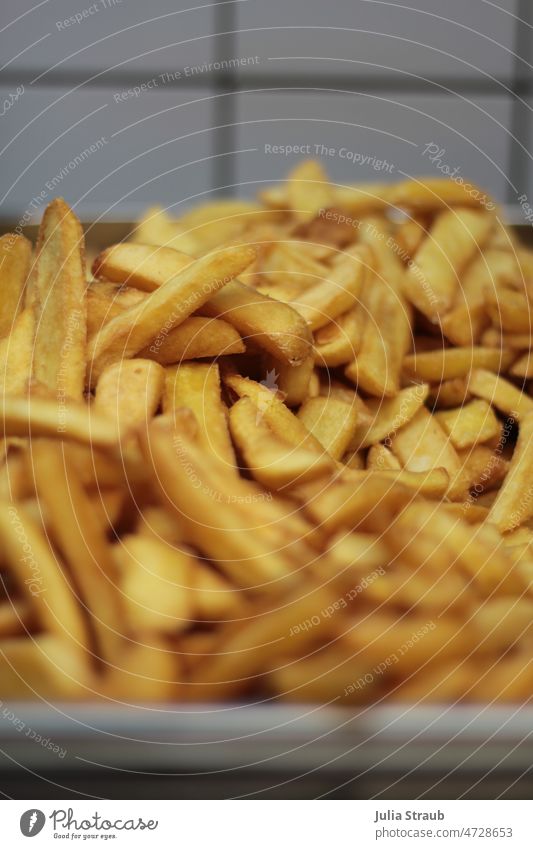 golden yellow fries French fries chip shop potato fried food fry Hot Gastronomy Many quantity food and drink Eating Fast food Snack bar Unhealthy Fat Delicious