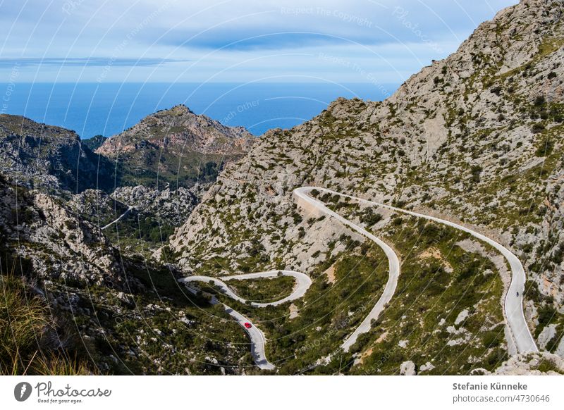 Curvy road in Mallorca on the way to Sa Calobra Majorca vacation Wide angle Spain Exterior shot Colour photo mountain road mountain pass serpentine road Slope