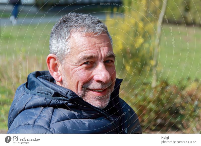 Portrait of smiling senior with gray hair and three day beard in nature Human being Man Senior citizen Male senior Adults Masculine 60 years and older