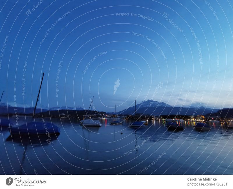 Evening atmosphere in Lucerne on the lake with view of Mount Pilatus Lake mountain mountains Mountain Landscape Nature Alps Exterior shot Colour photo Deserted