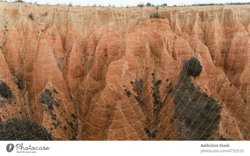 Rough arid canyon in nature countryside dry formation rock stone daytime geology terrain background mountain rough breathtaking picturesque spectacular daylight