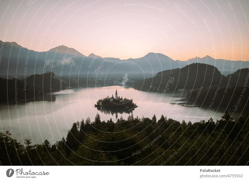 #A0# Lake Bled in the morning Slovenia mountain lake Idyll Sunrise Dawn Mountain mountains Mountain range Mountain ridge Island Church Cold chill Nature