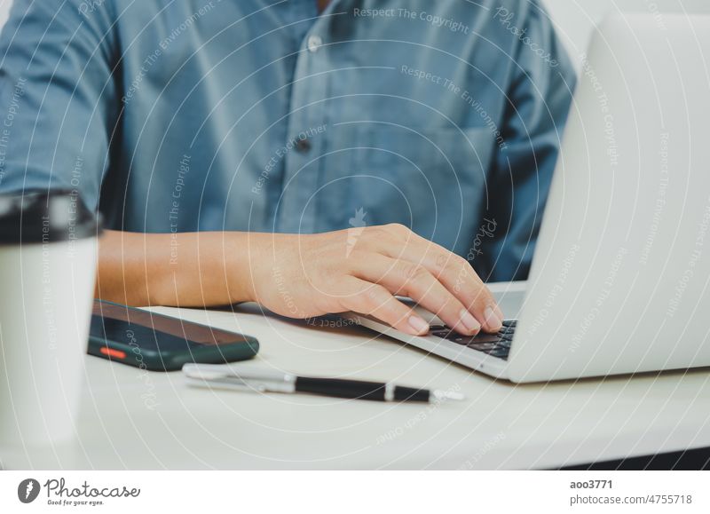 Business man using laptop computer at home. keyboard technology office business online work cyberspace notebook desk person typing modern network screen social