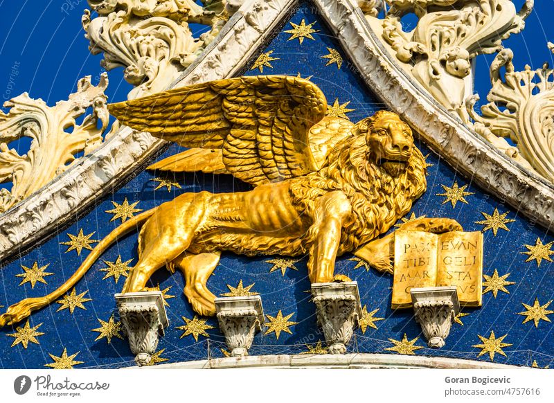 Golden lion on the top of St Mark's Basilica (San Marco) in Venice, Italy church gold venice architecture italian venetian golden cathedral italy statue