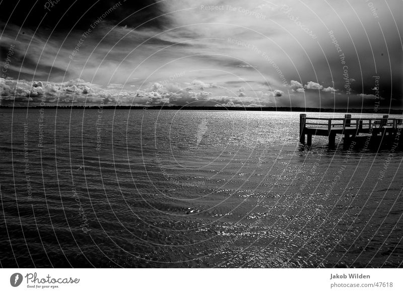 Pier solitude, Black and white portrayal of a serene fishing jetty