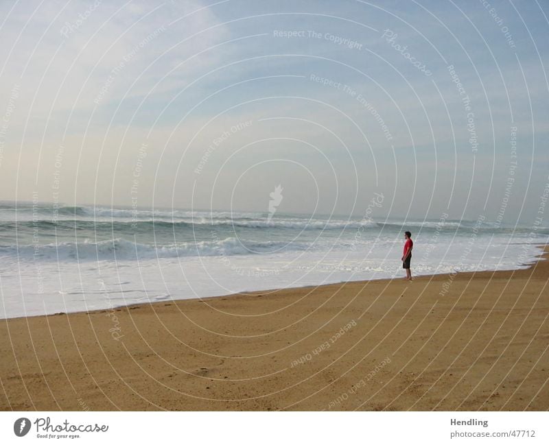 Alone with the sea Ocean Beach large waves man alone in front of the water the force of the waves hossegor- france