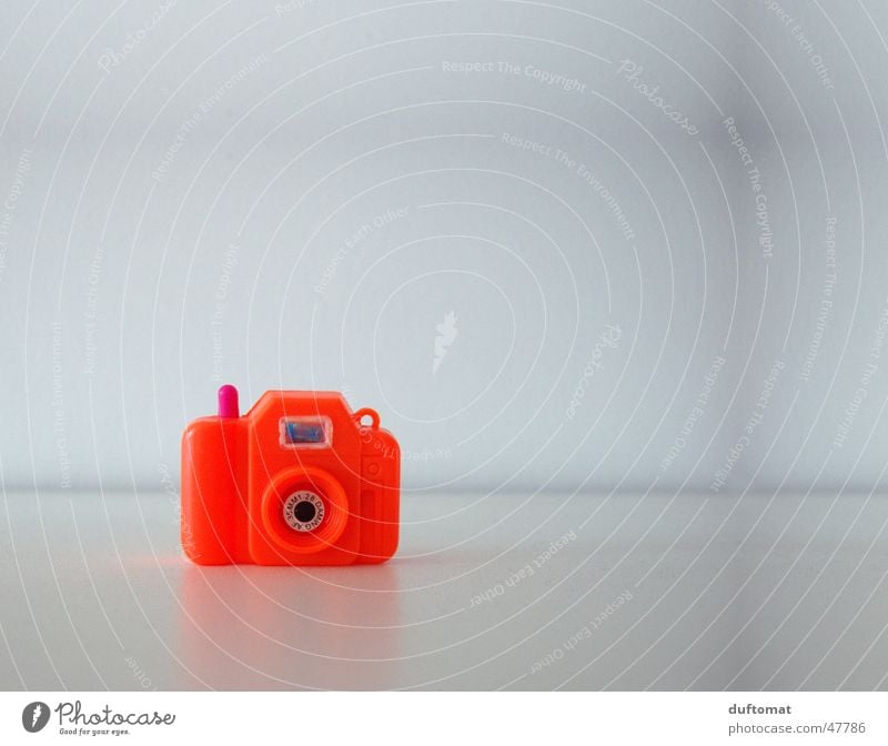 MiniPhoto Miniature Neon light Red Toys Clack Take a photo Photography Viewfinder Small Camera Orange photo camera Calm Focal point