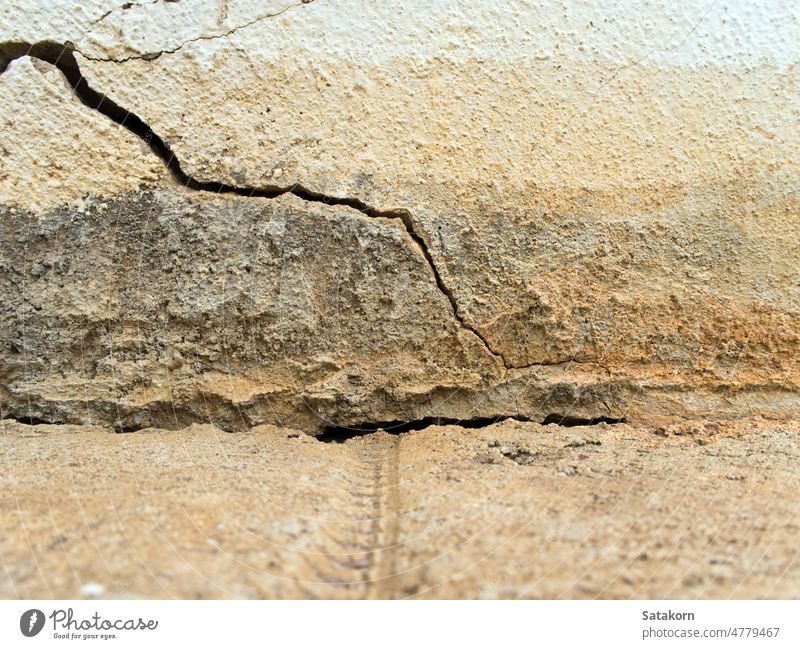 Cracked and separated of concrete floor and wall abstract aged ancient architecture break building cement construction crack detail dirty grey ground hard house