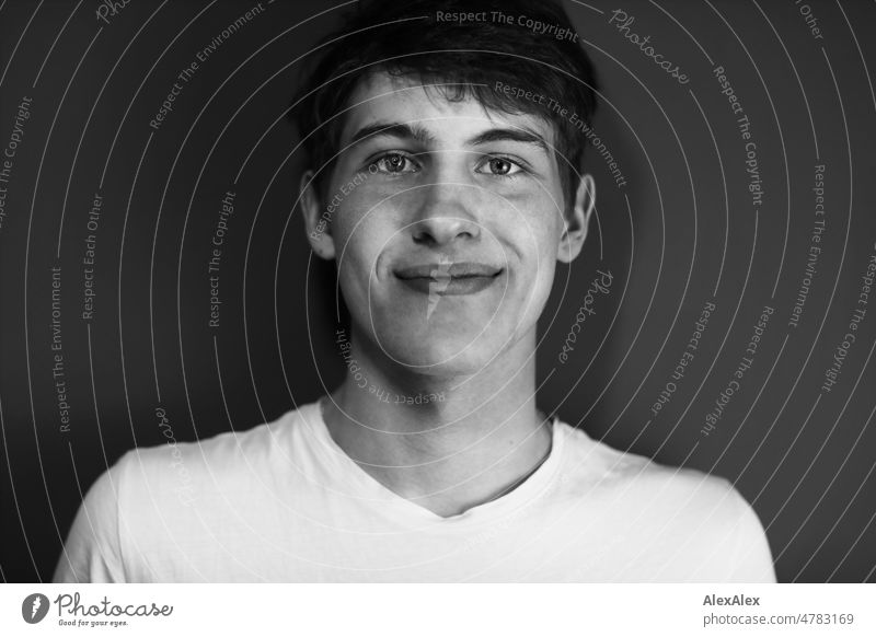 Portrait of young man with dimples on cheeks in black and white Boy (child) Man Young man younger Large pretty Strong Athletic youthful pit dimples on the cheek