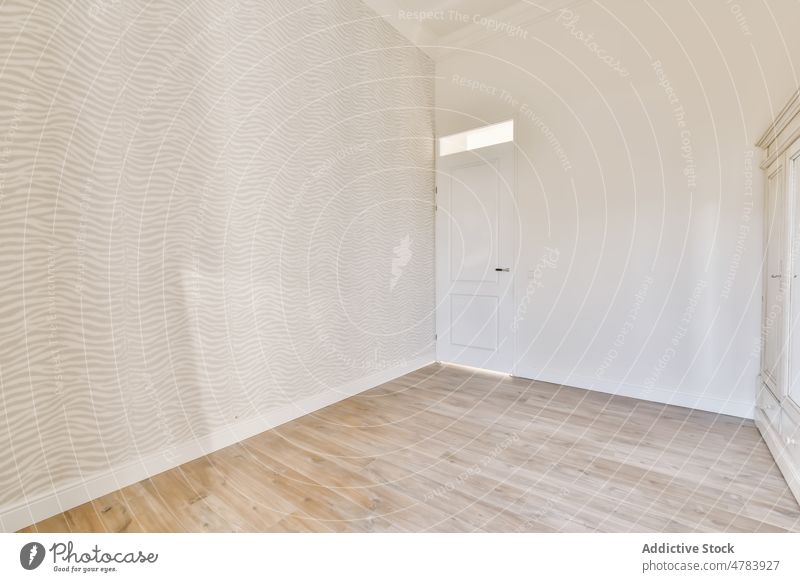 Interior of room with wardrobe with white doors closet corridor apartment interior classic furniture design spacious residential dwell flat property