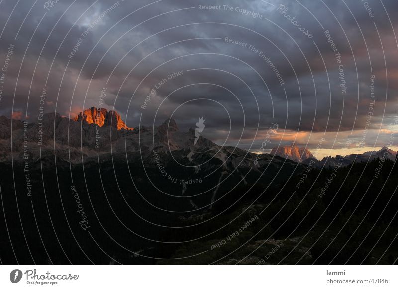 Alpine glow in the Dolomites Clouds Threat Italy Sunset Red Exterior shot Mountaineering landscape photograph Alps Climbing Thunder and lightning