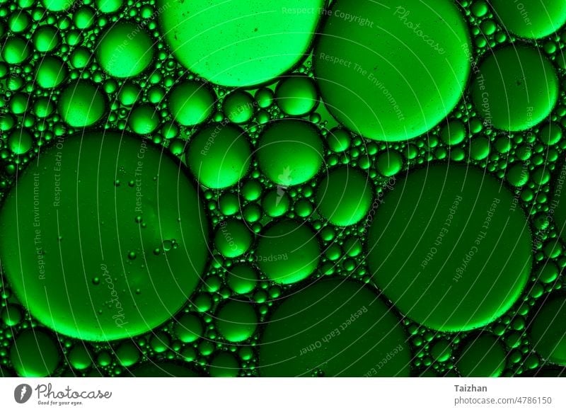 Abstract Green water bubbles background. Green Water Drops Background research abstract circle green alcohol biology cell drop fizz fluid glowing horizontal